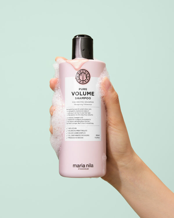 Maria Nila Pure Volume Shampoo bottle with rich lather