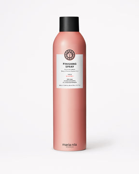 Pink hair spray bottle with black cap on a white background