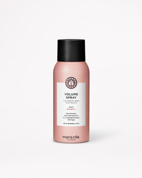 Pink bottle of Maria Nila Volume Spray on a white background