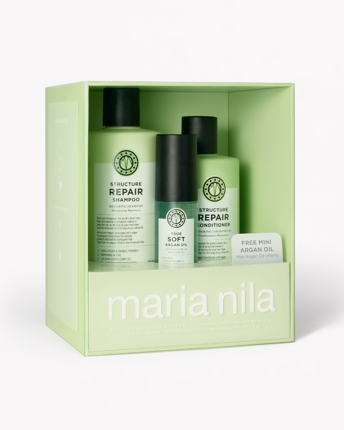 Maria Nila hair care set in a light green gift box, featuring Structure Repair Shampoo, True Soft Argan Oil, and Structure Repair Conditioner.