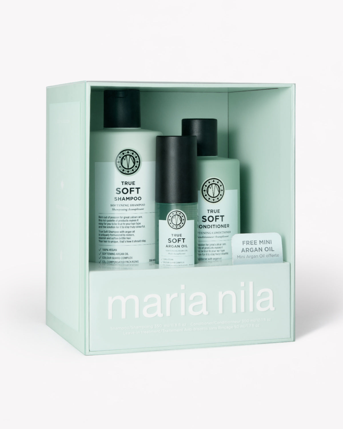 Maria Nila True Soft hair care set in a mint green gift box, featuring shampoo, conditioner, and an argan oil bottle.