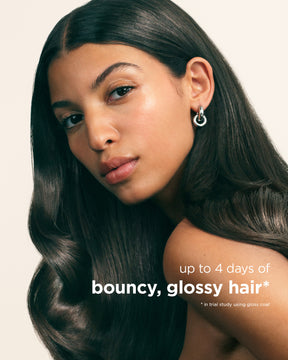 Woman with long, wavy hair against a plain background with text about hair care.