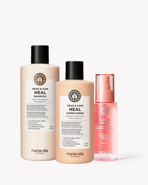 Three Maria Nila hair care products on a white background