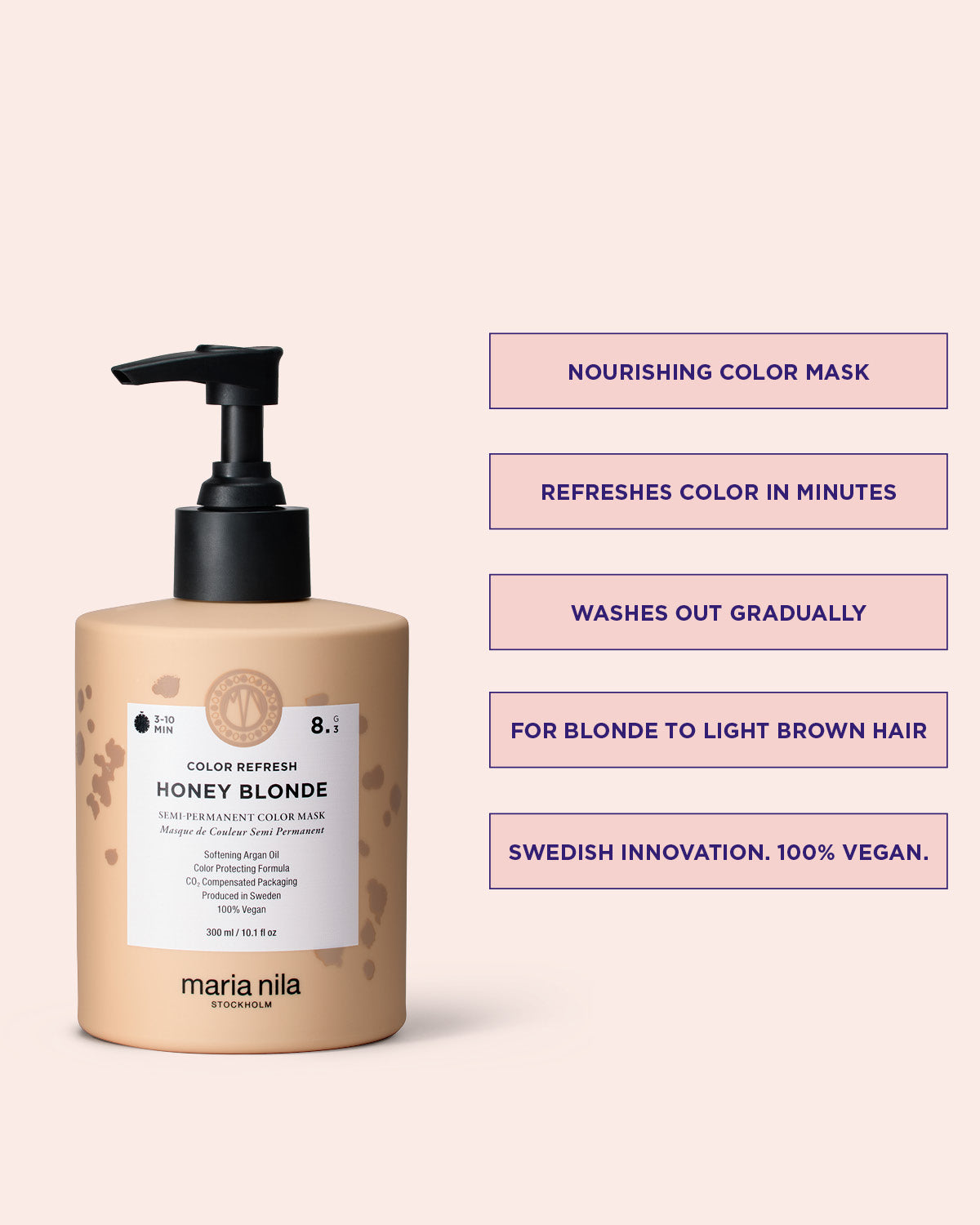 Maria Nila hair mask bottle with product details on a pink background